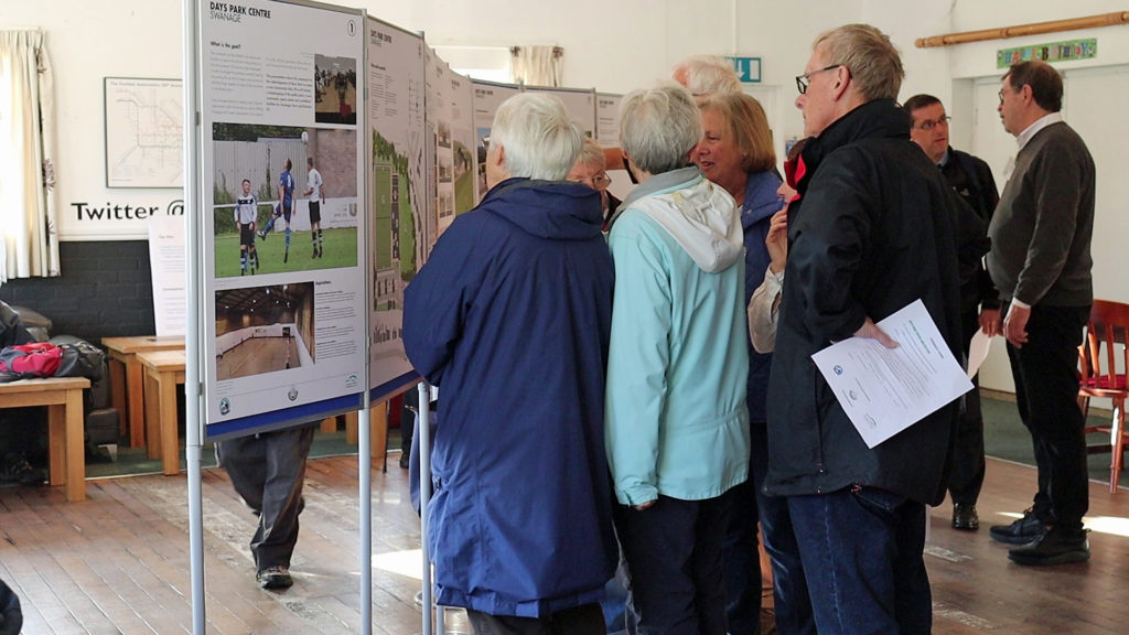 People looking at the football redevelopment plans