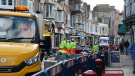 Workmen in Institute Road while it is closed for roadworks February 2020.