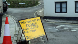Rolling road closure for resurfacing sign