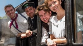 Cast members of Swanage Rep on a steam train