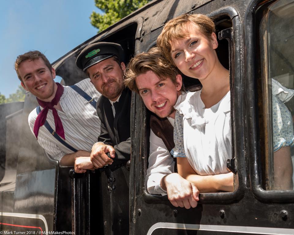 Cast members of Swanage Rep on a steam train