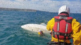 Swanage Lifeboat rescues a capsized boat