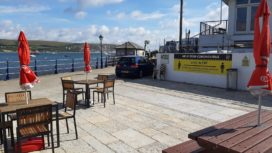 Swanage Pier with socially distanced tables