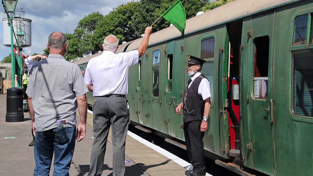 The Mayor waves off the first train at Swanage Railway after lockdown