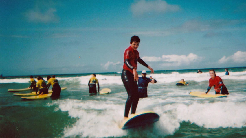 Young people on surf boards