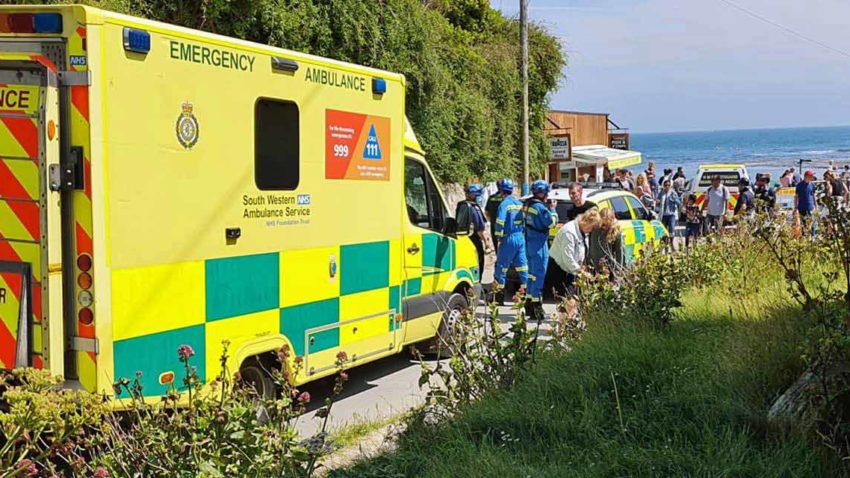 Coastguard, ambulance car and ambulance at Lulworth