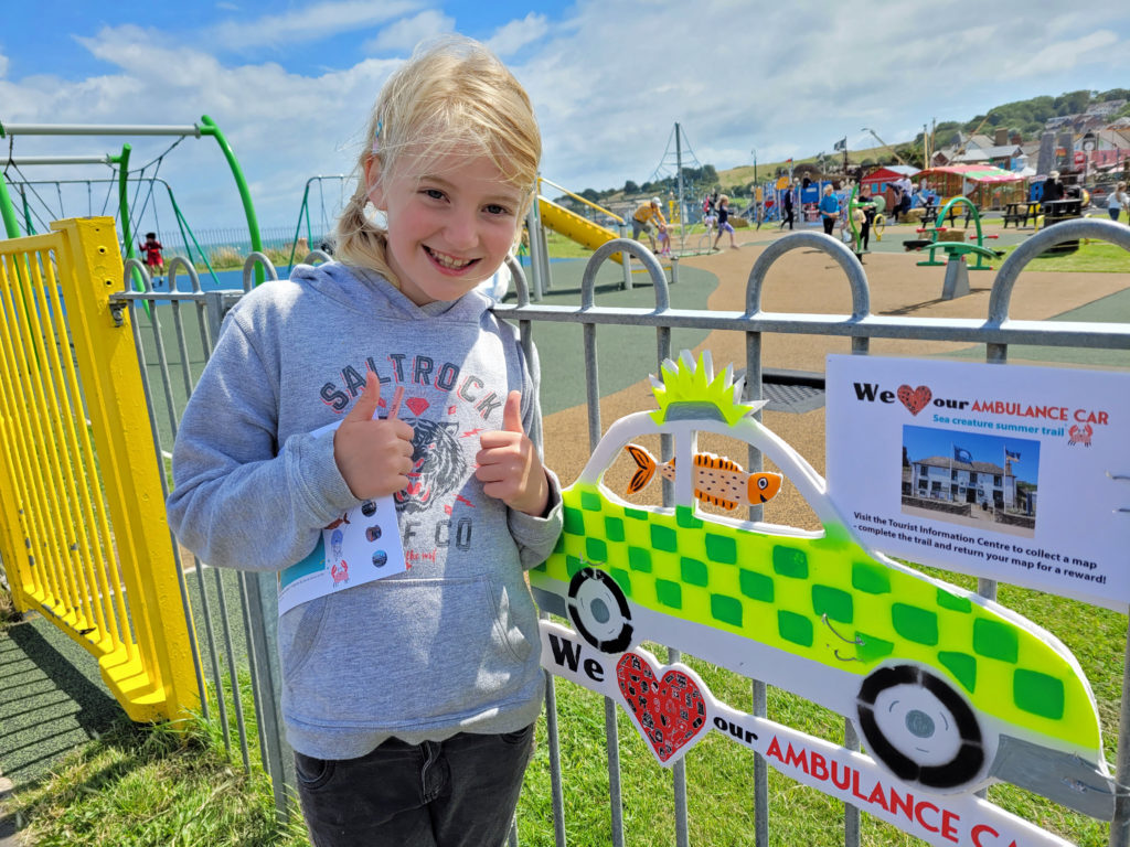Children undertake the ambulance car summer trail 