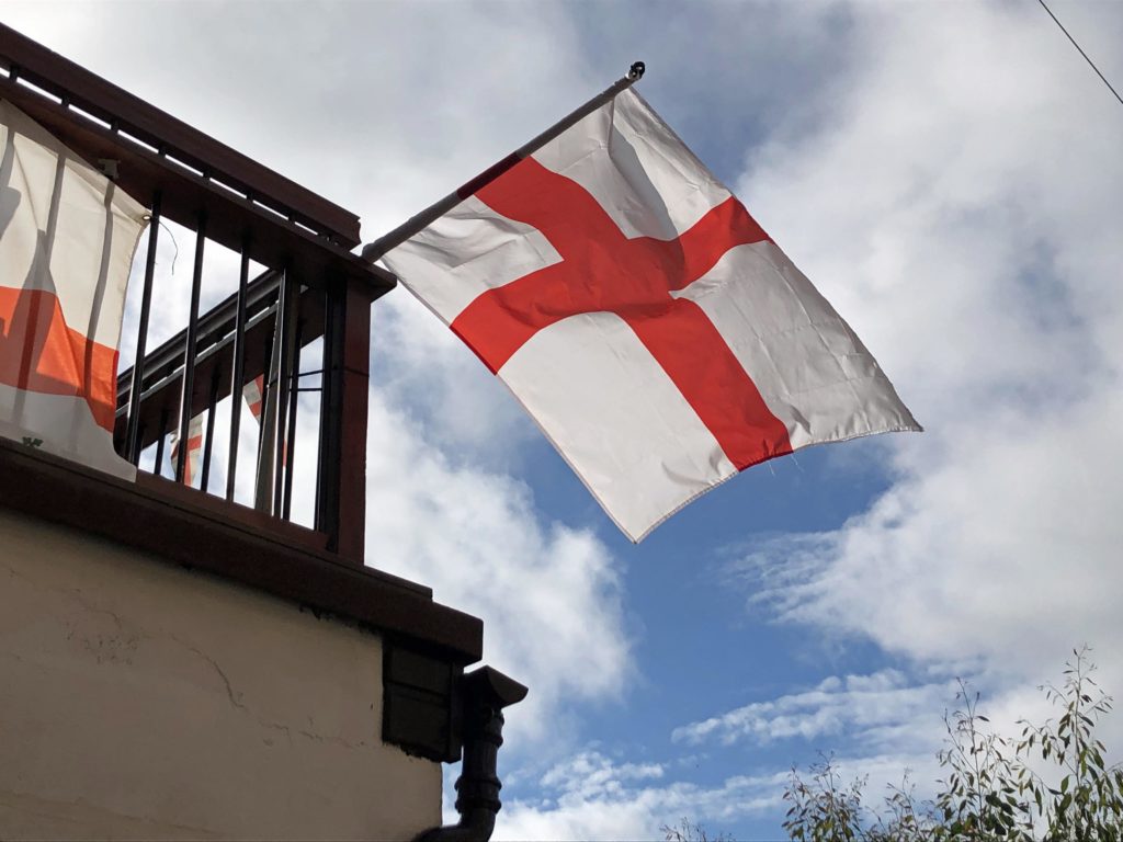 England flag flying from building in Swanage