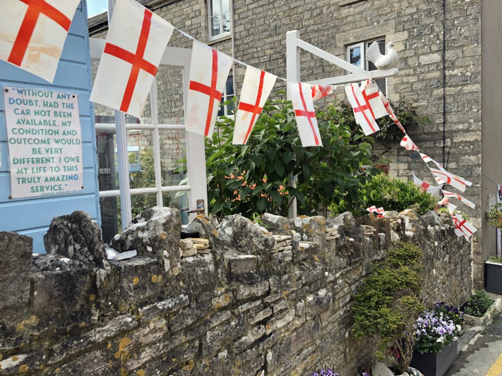 England flags flying from building in Swanage