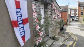 England flags flying from building in Swanage