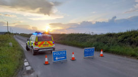 Police close road after car collision near Kingston