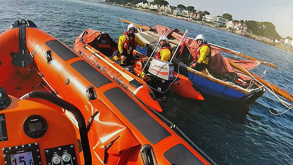 Poole lifeboat rescue yacht from ferry