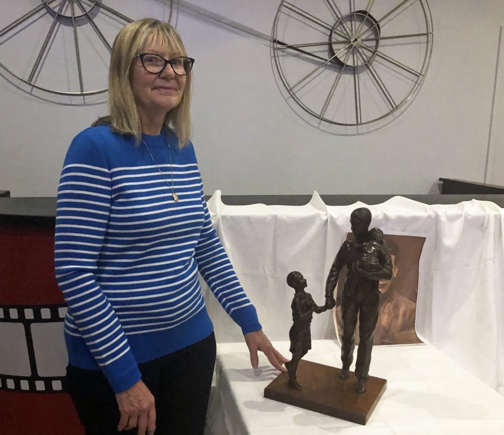 winner Lyn Coleman at Raffle draw for Trevor Chadwick statue