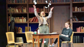 Scene in the stage production of Rita when money is thrown in the air