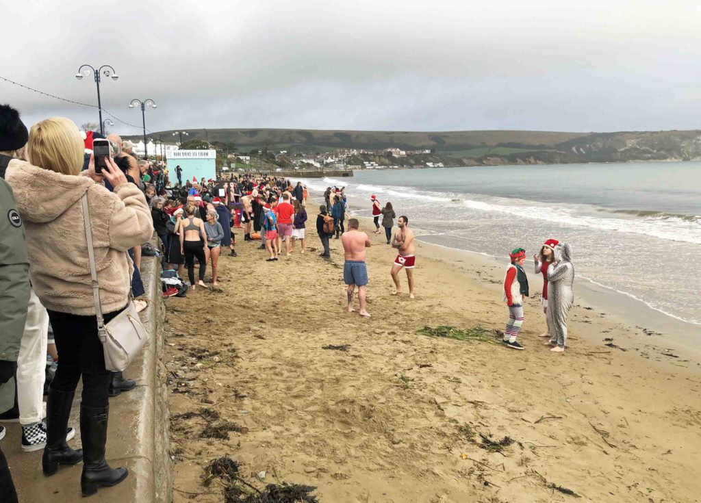 Swimmers getting ready for the Boxing Day swim in Swanage Bay