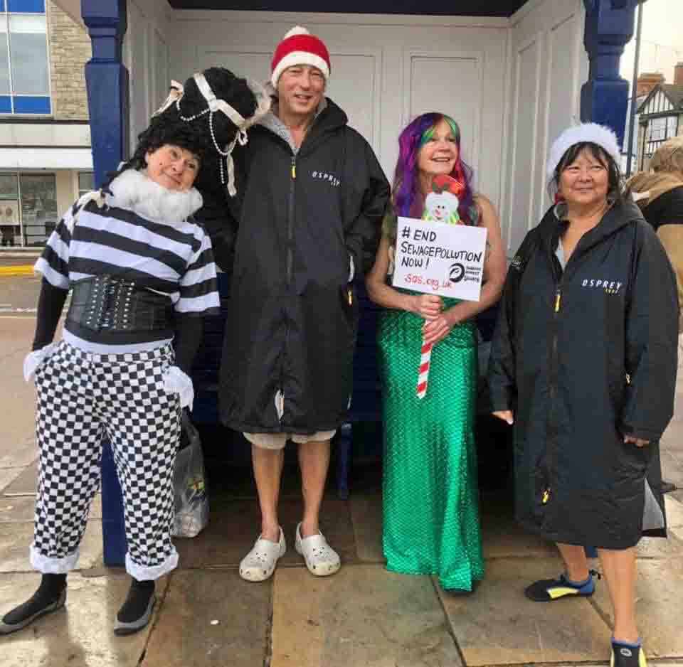 Swimmers dressed up for Boxing Day swim in Swanage 2021