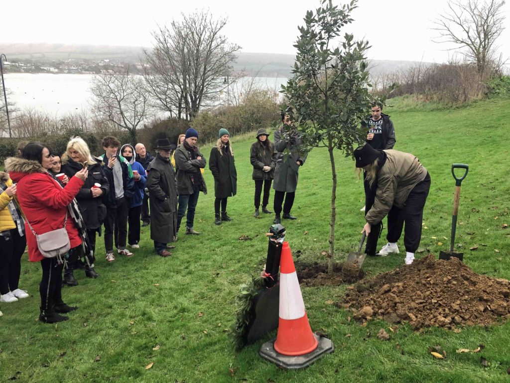 Planting a tree in memory of Henry Searle