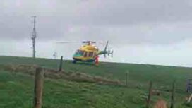 Air ambulance at Nine Barrow Down
