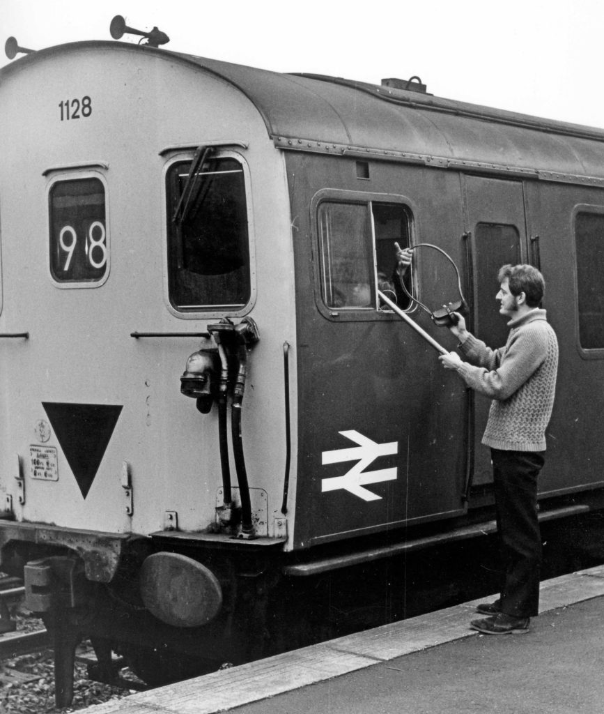 Bob Richards with Peter Frost in train cab Corfe Castle December 1971