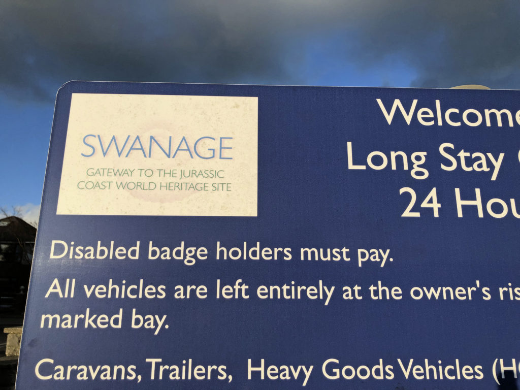 Blue badge holder sign in Swanage car park