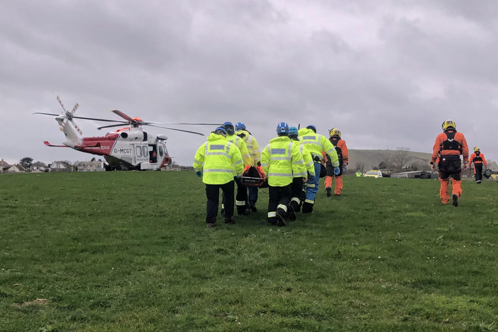 Coastguard rescue of walker in North Swanage