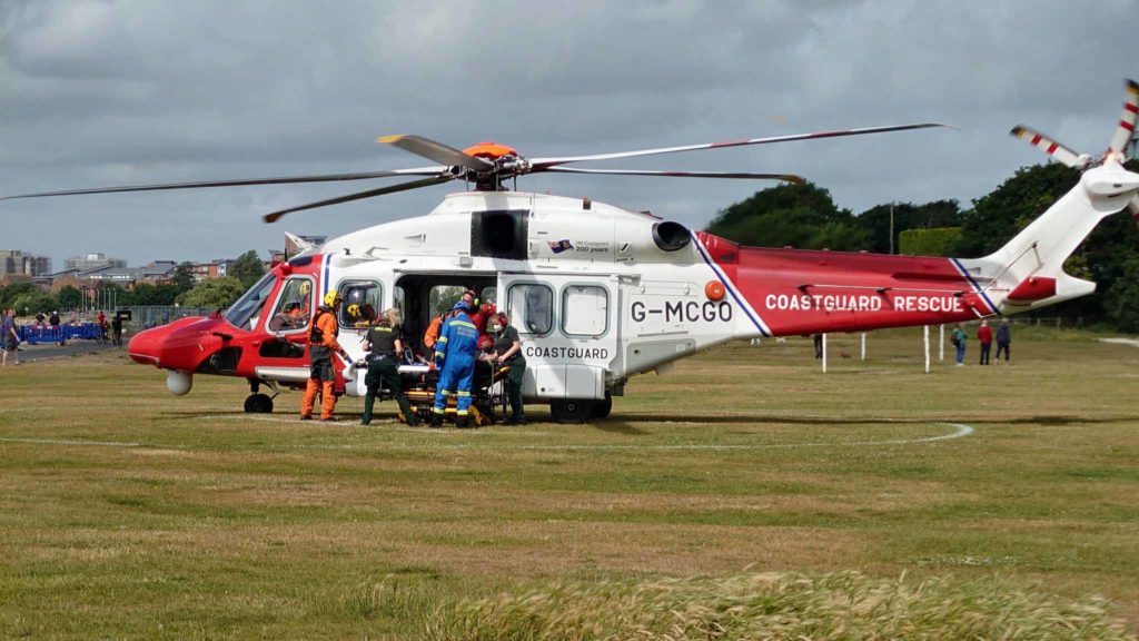Coastguard rescue helicopter at Whitecliff helicopter landing site