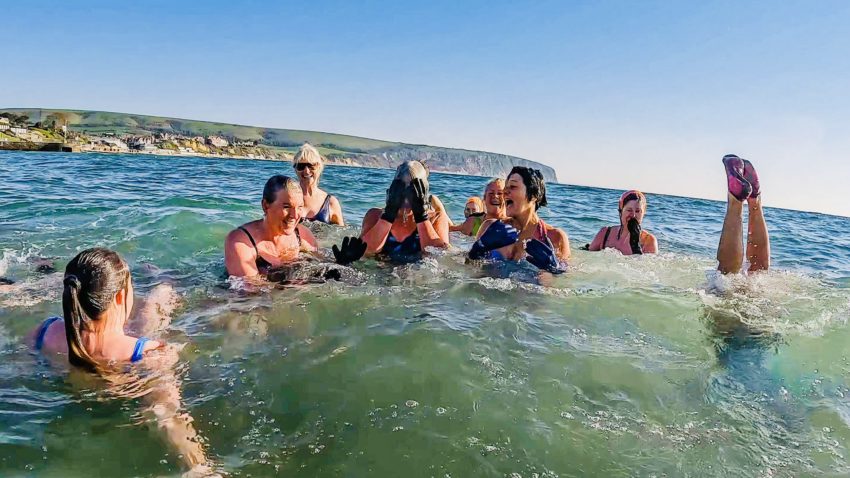 Wild swimming in the sea in Swanage
