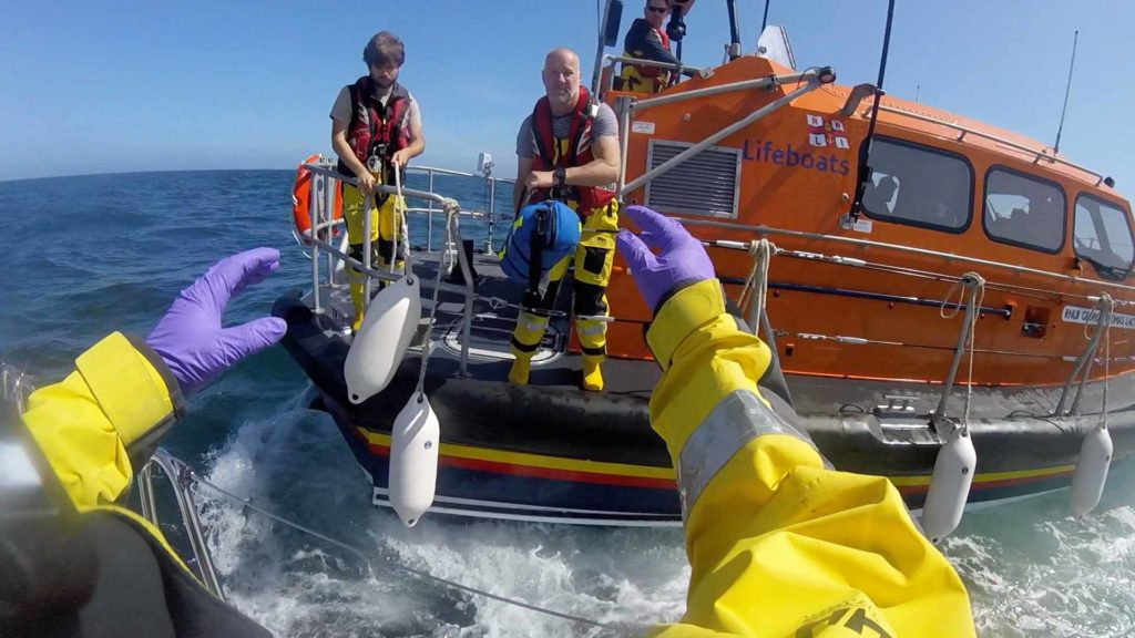 Swanage lifeboat rescue sailor with injured hand