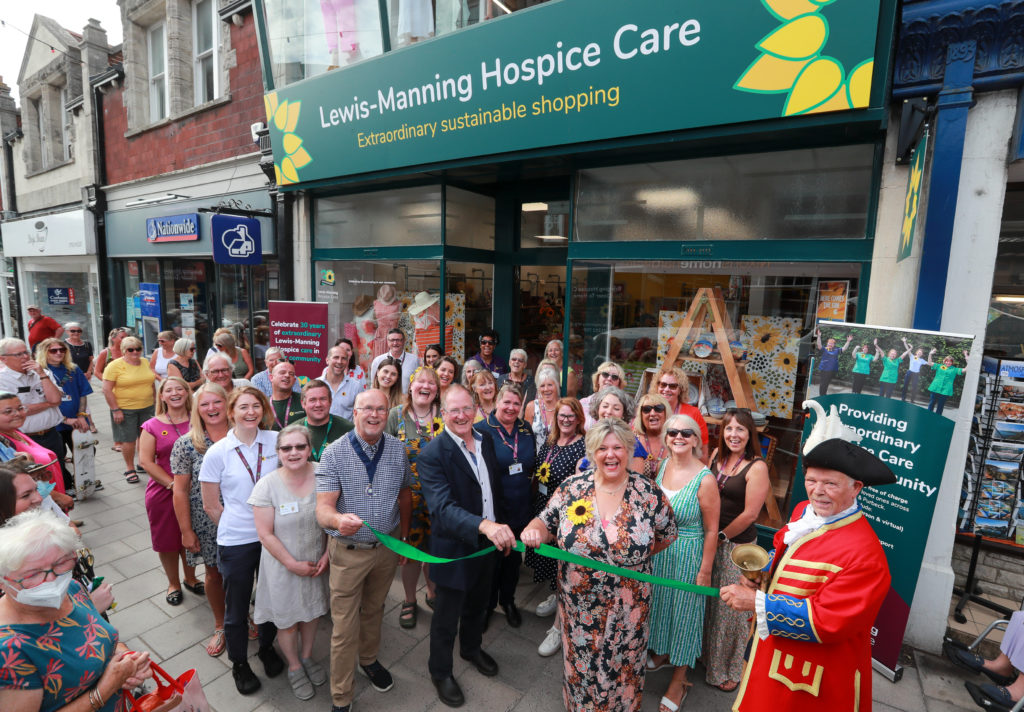Opening of Lewis-Manning Hospice Care shop in Swanage. Sir Christoper Lees, Trustee of the Talbot Village Trust officially opens the new shop with Clare Gallie, CEO of LMHC and Dep Mayor of Swanage Cllr Chris Moreton.