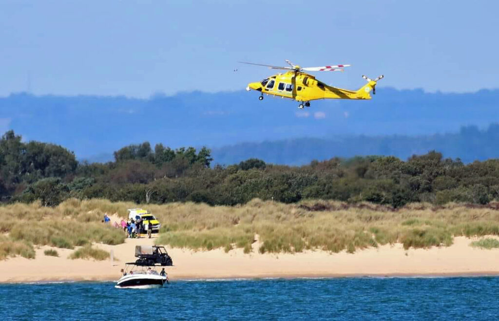 Air ambulance and coastguard at Studland