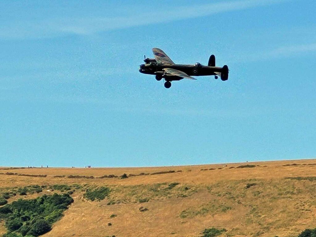 Lancaster bomber flies over Ballard Down for Swanage Carnival 2022