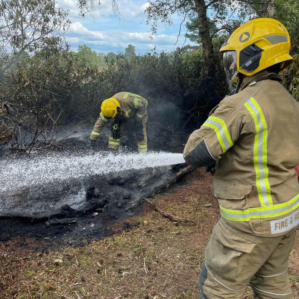 Firefighters extinguishing fire at Worgret Heath