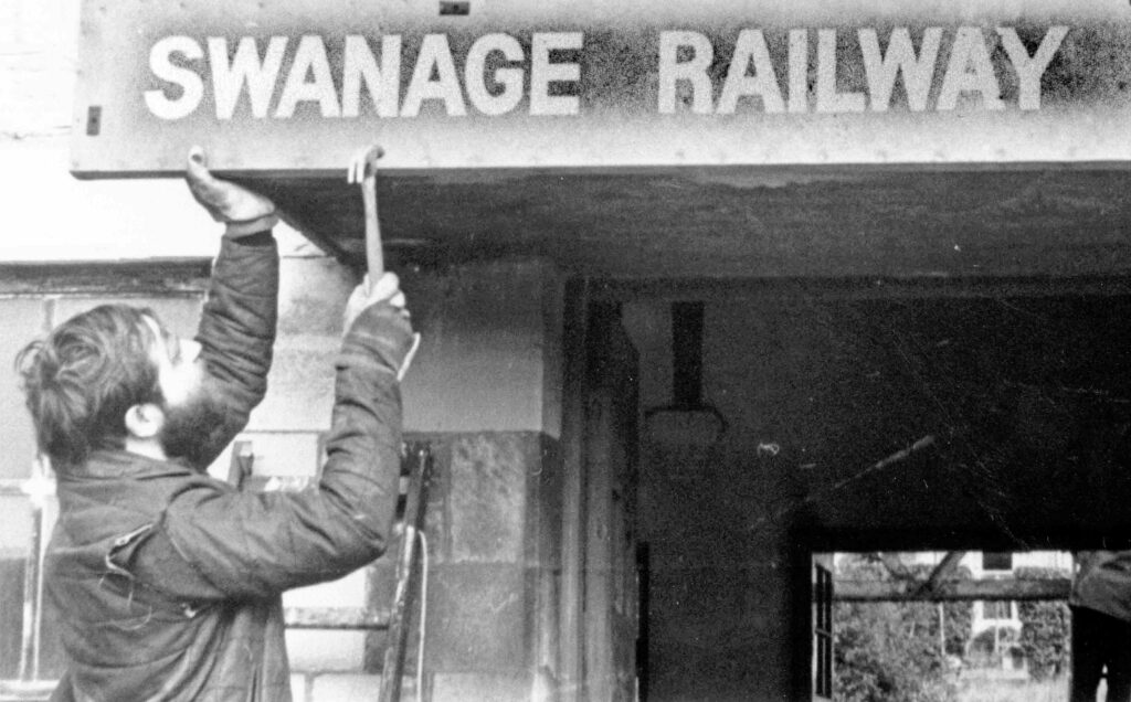 Andrew Goltz carrying out renovations at Swanage Railway Station in 1976