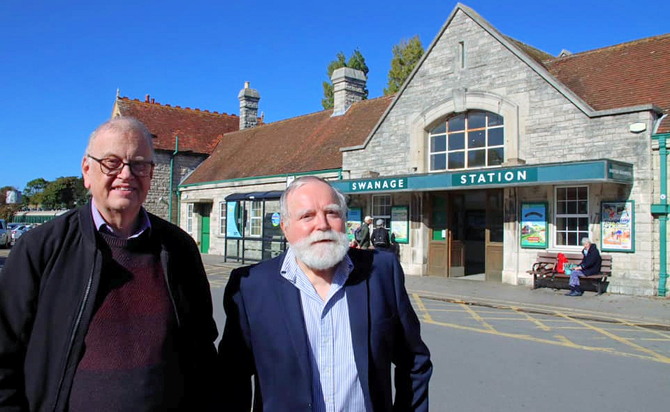 John Sloboda with Andrew Goltz at Swanage Station, whose keys they obtained in 1976