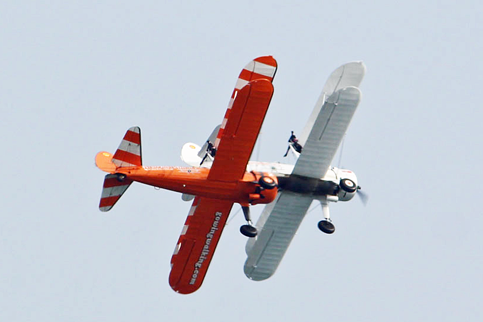 The wingwalker planes pictured earlier in the flying display