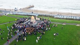 Wreath laying ceremony from the air at Swanage War Memorial