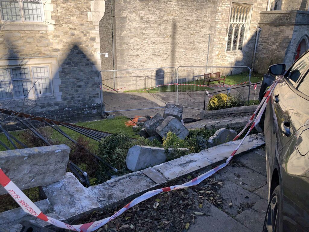 Car damages st Mary's church wall
