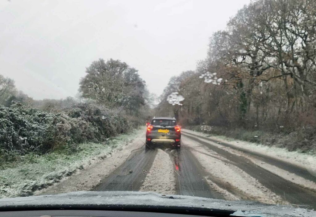 Snow on road out of Swanage