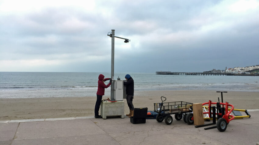 Installation of beach scanner by Univerity of Plymouth researchers on Swanage Beach