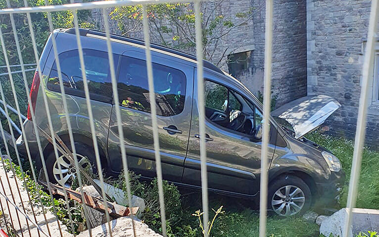 Grey vehicle crashed into St Mary's church