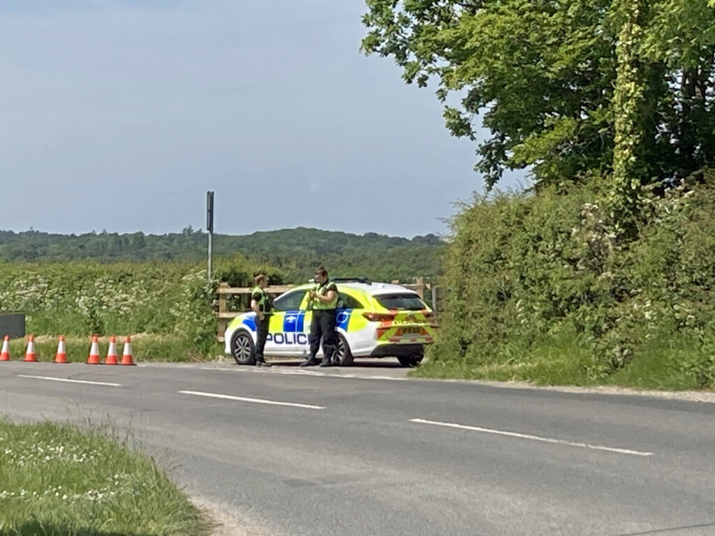 Police block off road to rave (