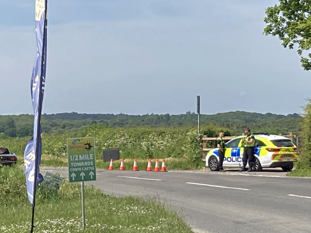 Police block off road to rave (