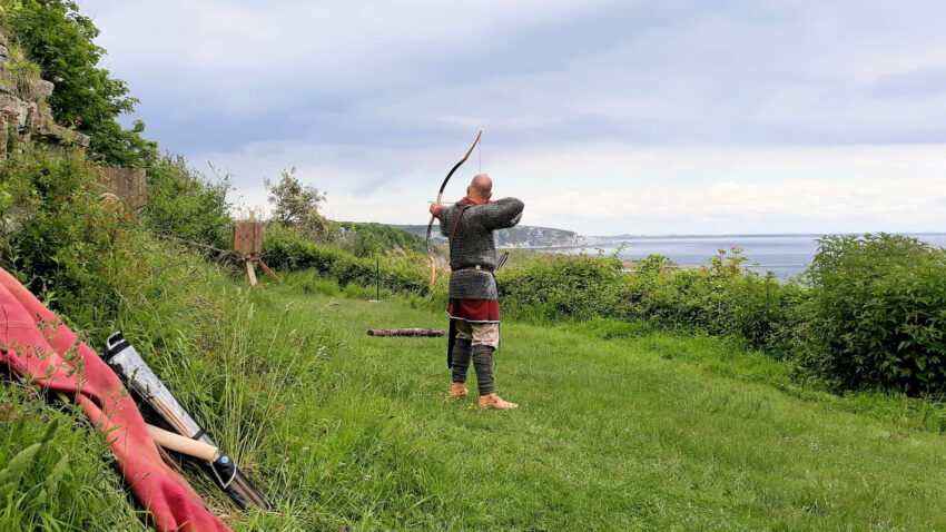 A Saexia bowman practises at Durlston country park, keeping an eye on the sea for Viking invaders