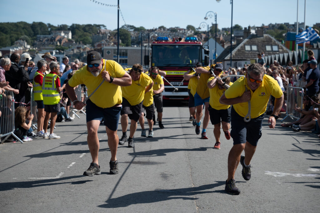 Fire Engine pull team at Swanage Carnival