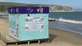 Ice cream kiosk on beach at Swanage seafront
