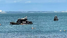 A Dorset police rib and helicopter were sent to sightings of a deflated boat in Swanage Bay