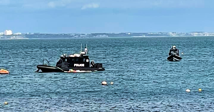A Dorset police rib and helicopter were sent to sightings of a deflated boat in Swanage Bay