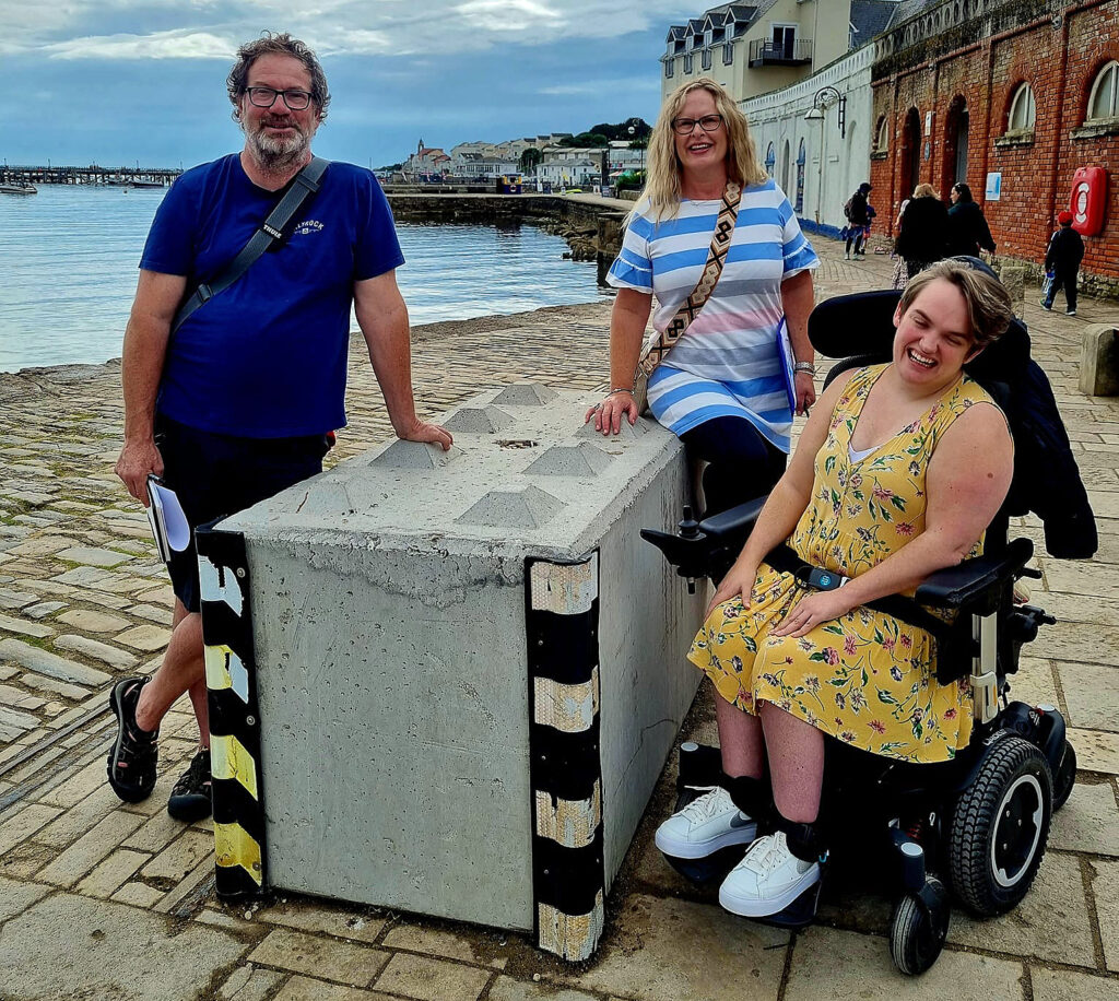 Andy Knill, Sara Parker and Hatty Greenway with Swanage art trail block