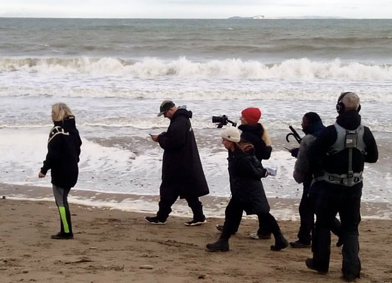 BBC Countryfile's Ellie Harrison filming on Swanage Beach
