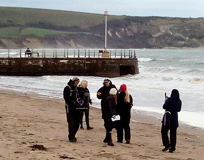 BBC's Countryfile Ellie Harrison filming on Swanage Beach